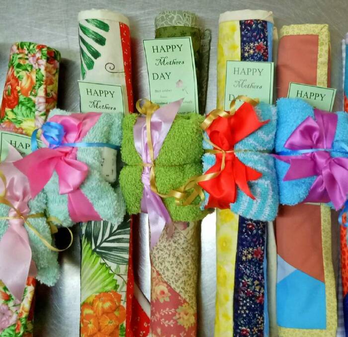 GIFTS: Meals on Wheels recipients from Cleveland receive some mother's day gifts.