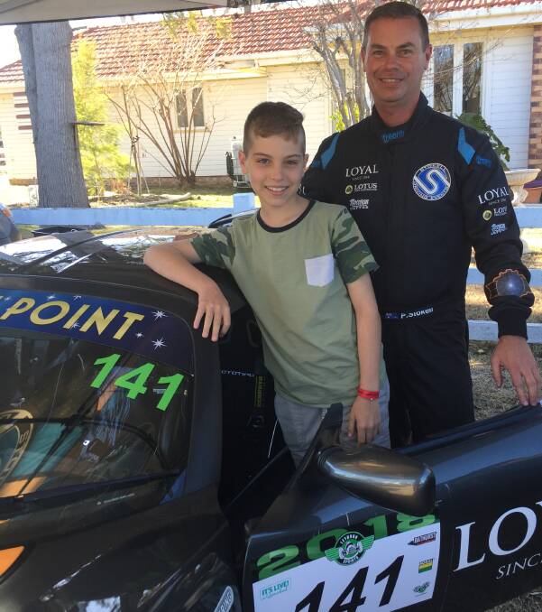 GENERATION: Oscar Stokell is keen to follow in his father's footsteps as a champion racing driver. Paul Stokell recently won first in his class at the Leyburn Sprints.