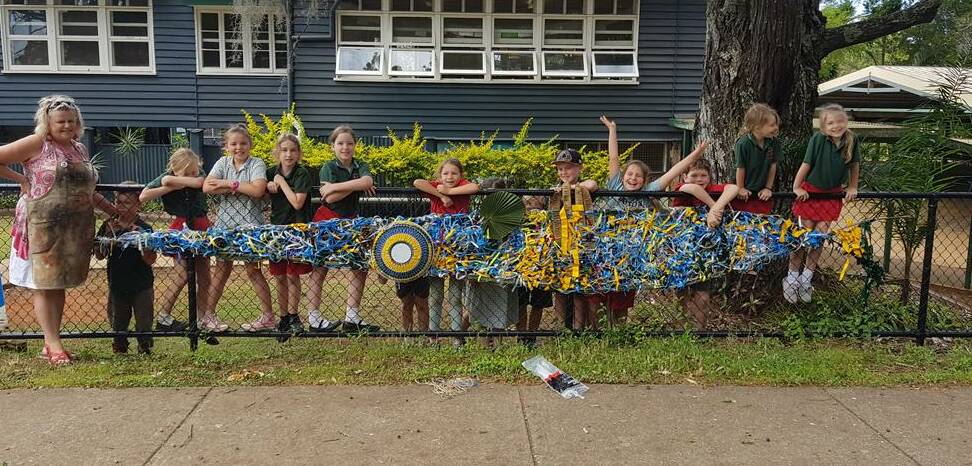 FISH: Students at Russell Island State school catch a big one with this fish created out of recycling products.