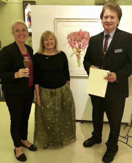 EXHIBITION: Kim Richards, artist Clare Loveband and Lance Hewlett share some stories at the launch of a botanical drawing exhibition at the Redland Museum.