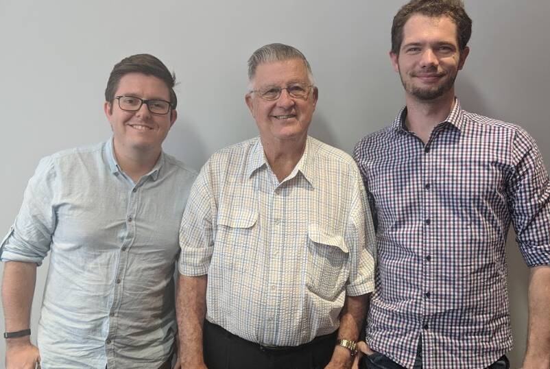 CONGRATULATIONS: Switchnode founders Nathan Smith and Rusty Routledge thank Redland Foundation president Don Seccombe for a significant grant.