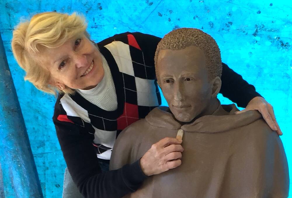 SHAPING AN ICON: Birkdale sculptress Georgette Schwantes works on her sculpture of St Martin.