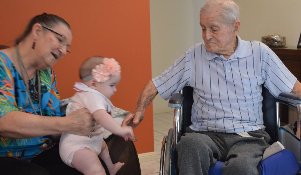 GENERATIONS: Bill Cann interacts with his great grand daughter Elara McNally with his daughter Chris Copper.