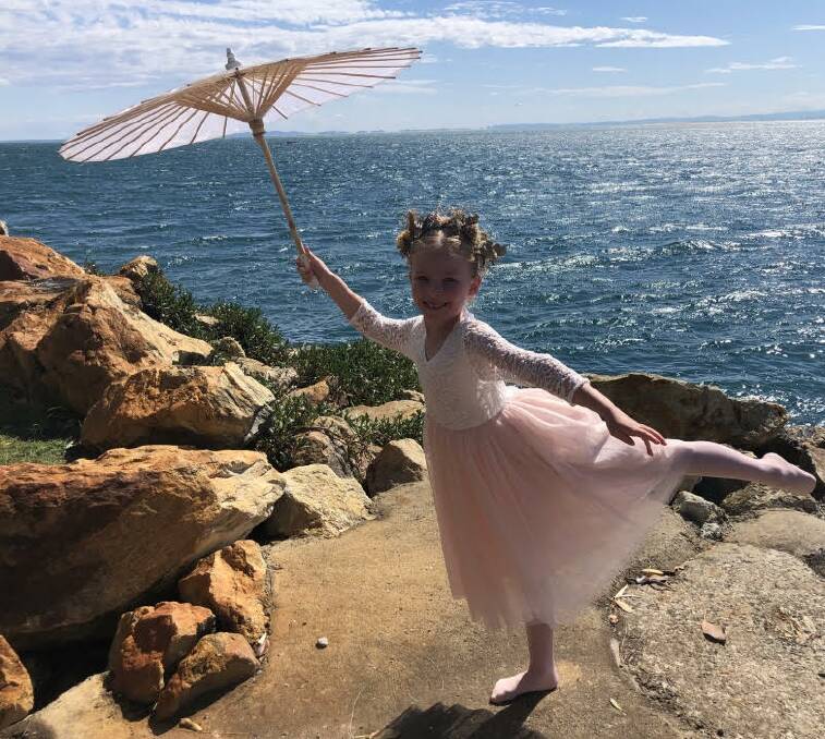 STRADBROKE: Kayla Milligan chose North Stradbroke Island to strike this ballet pose, which earned her a chance to perform in Queensland Ballet's production of The Nutcracker at QPAC in December.