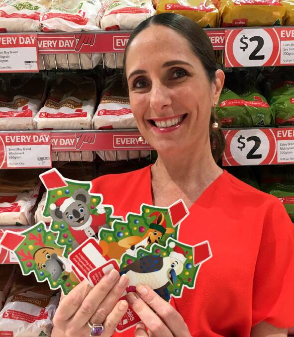 REDKITE: Redkite's Monique Keighery shows how easy it is to give to Redkite this Christmas through a Coles charity campaign.