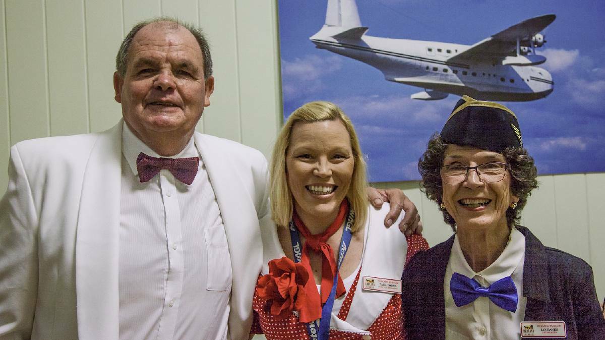 FLY: Terence Hendricks, Tara Young and Jan Banks look forward to the 2019 Aeronautical Dinner dance, being staged at the Redland Museum on October 19.