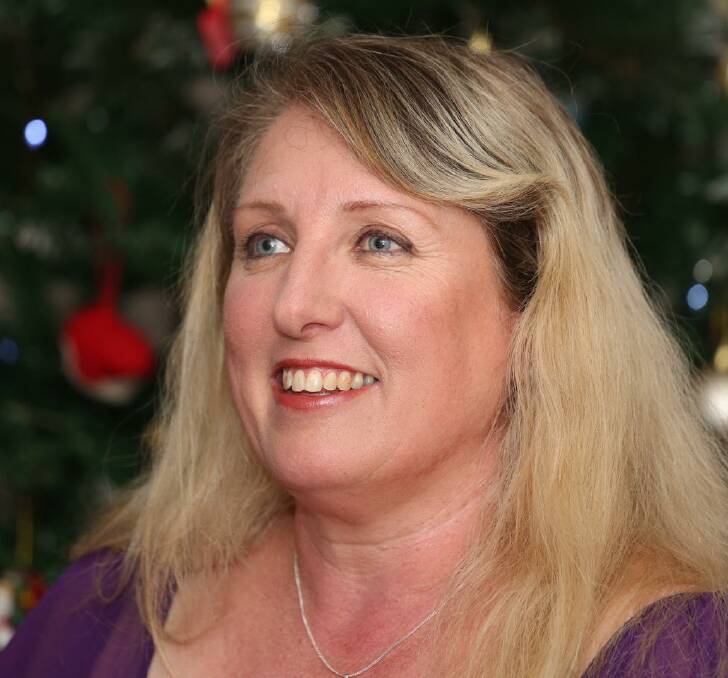 WHITE CHRISTMAS: Redland city choir conductor Anita Taylor is preparing for the choir's White Christmas concert on December 13 and 14.