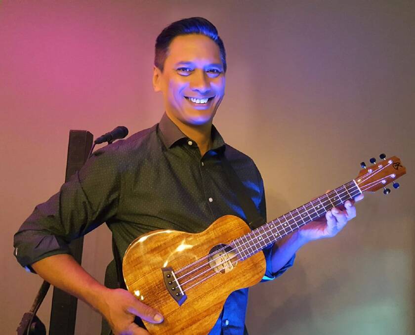 WORKSHOP: Vic Kena plays ukulele at Binary Music, Cleveland on  December 15.
