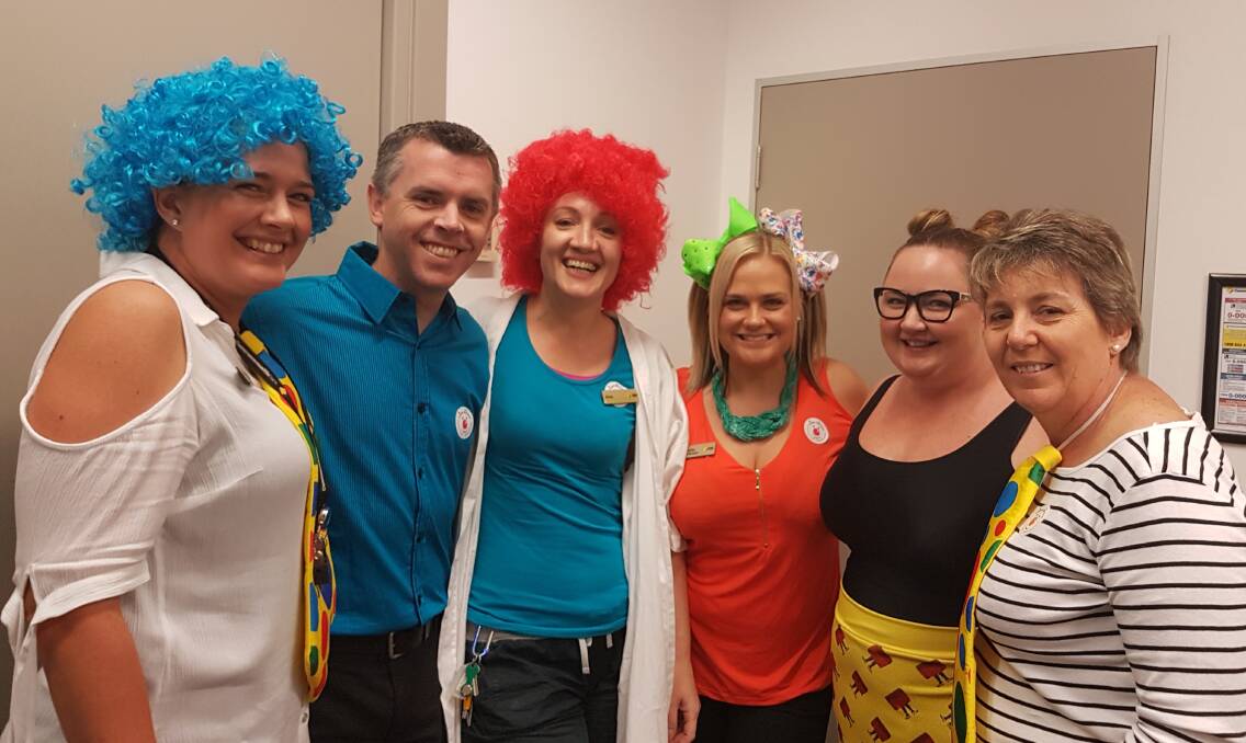 CLOWNING: Raising funds for Clown Doctors are Commbank Cleveland staff Fran Vincent , Steven Medford, Carly Goodwin, Manager Samantha Laws, Jess Ratcliffe and Karlene Manhire.