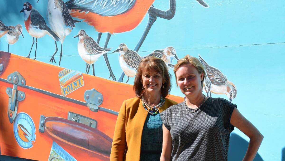 MURAL: Deputy Mayor Cr Wendy Boglary and artist Deb Mostert in front of a new mural, painted in Oceanic Street, Wellington Point.