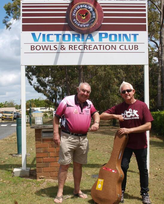 NEW HOME: Gary Walters and Geoff Carwardine celebrate the new home for Folk Redlands at the Victoria Point Bowls and Recreation club. Photo: Trevor Davis.