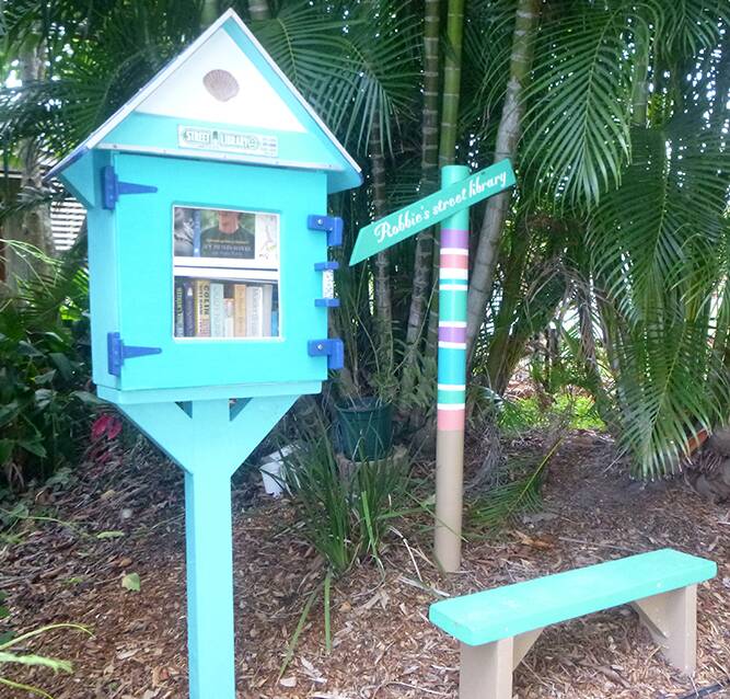 BOOKS: One of the street libraries at Macleay Island, in Dalpura Street.
