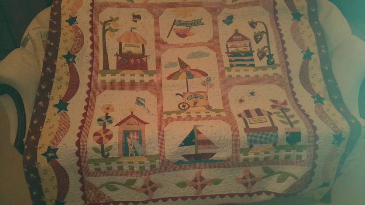 PRIZE: The winning quilt won by Clive and Ann.