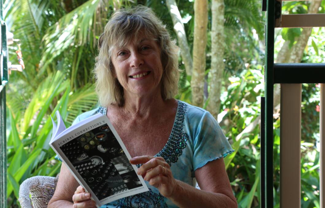 ANTHOLOGY: Robbie Kirk with the anthology Scribal Connections V, as written by members of the Macleay Island Inspirational Writers Group.