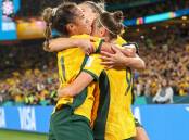 Matildas players Mary Fowler, Steph Catley (middle) and Caitlin Foord celebrate after Foord's goal in their 1-0 win over Denmark. Picture by Adam McLean.