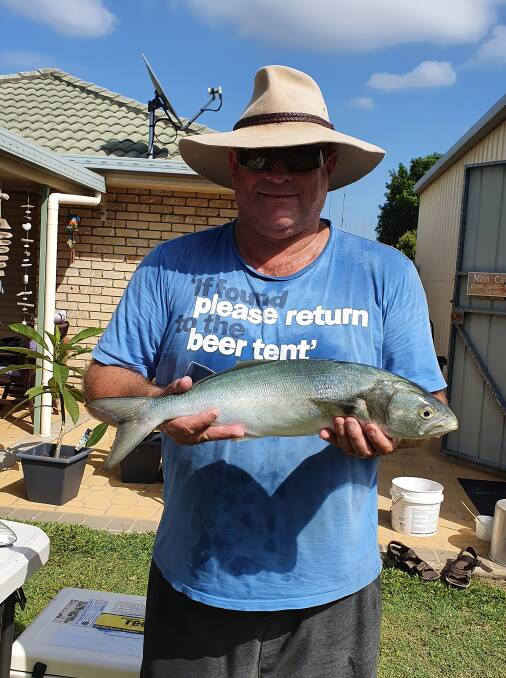 RIPPER: Michael Gibson with a shopper tailor he caught on Main Beach, off North Stradbroke Island.