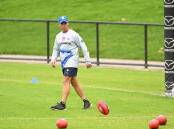North Melbourne coach Alastair Clarkson faces a challenge against his former club Hawthorn. (James Ross/AAP PHOTOS)