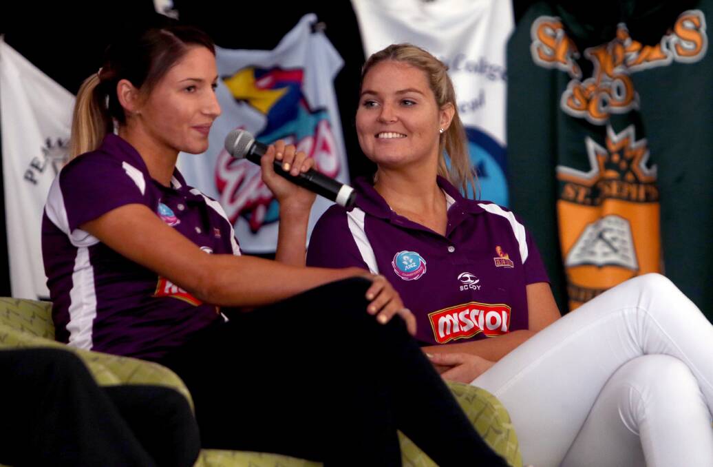 Queensland Firebirds netballers Kim Ravaillion and Grettel Tippet were special guests at the launch of the QISSN Carnival at Carmel College on Sunday. Photo by Stephen Archer