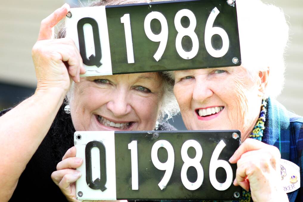 Lions Club of Cleveland Challenge president Pauline Denisenko (left) and secretary Celeste Parker with Q Plates the club is selling to raise money for Queensland's battling farmers.  
Photo by Chris McCormack