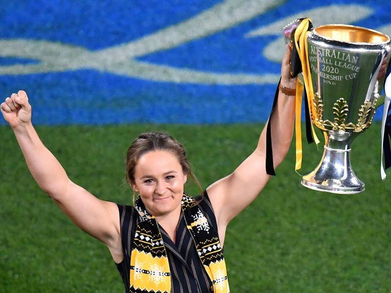 Ash Barty, seen here with Richmond's 2020 premiership cup, is always welcome at Punt Rd.