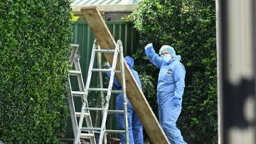 A man was found dead and his wife with serious head injuries at a Burpengary home north of Brisbane. (Darren England/AAP PHOTOS)