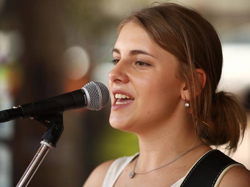 16-year-old busker Hudson Rose performs at the 2019 Tamworth Country Music Festival.