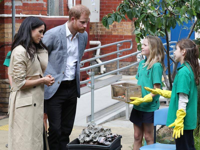 Harry and Meghan were shown a snail from the Albert Park Primary School garden during their visit.