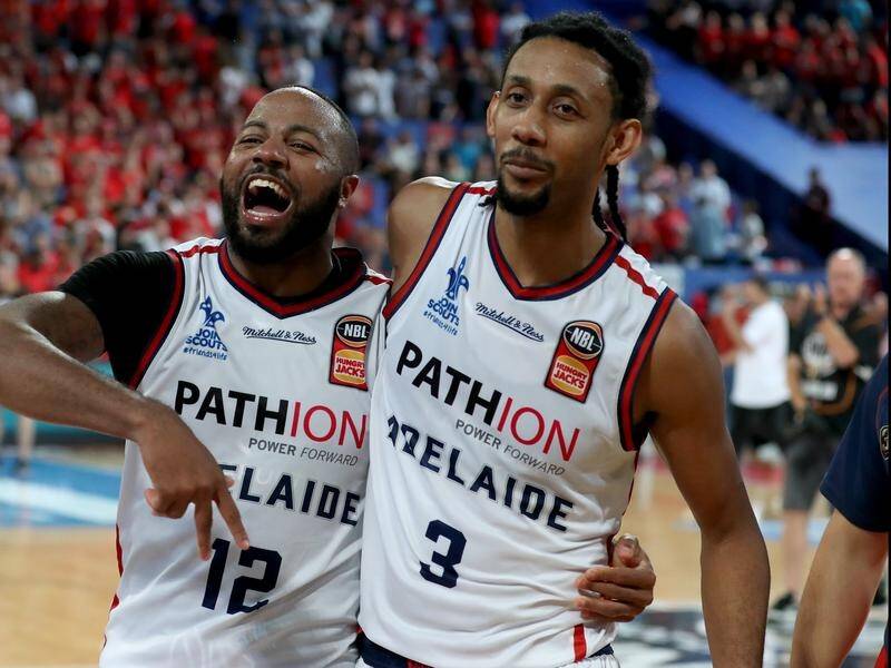 Shannon Shorter (left) and Josh Childress celebrate the 36ers sealing a NBL grand final spot.