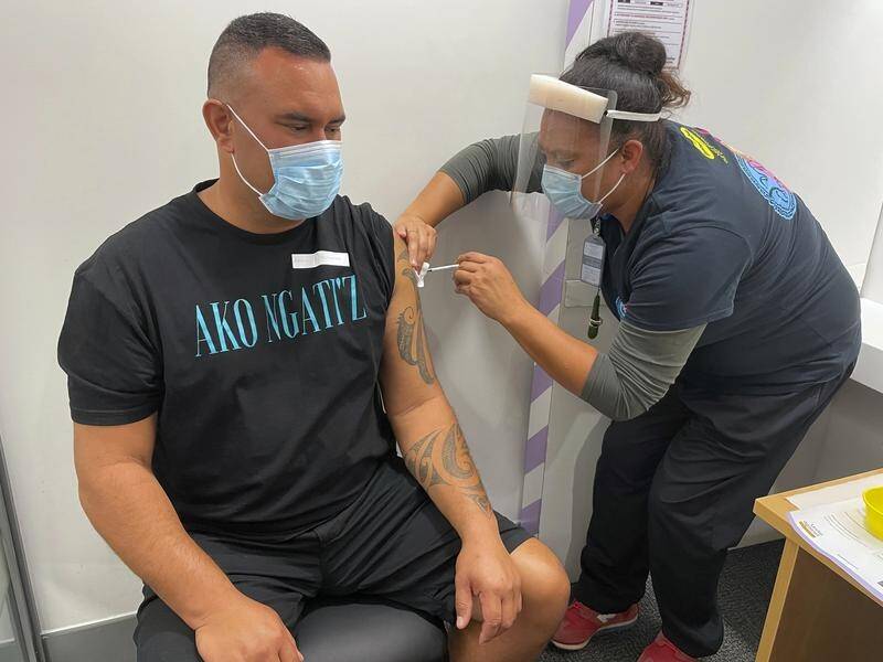 Aaron Te Moananua receives a dose of the Pfizer COVID-19 vaccine in Auckland.