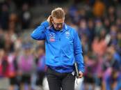 Kangeroos coach David Noble has some head-scratching to do after their 112-point loss to Geelong.