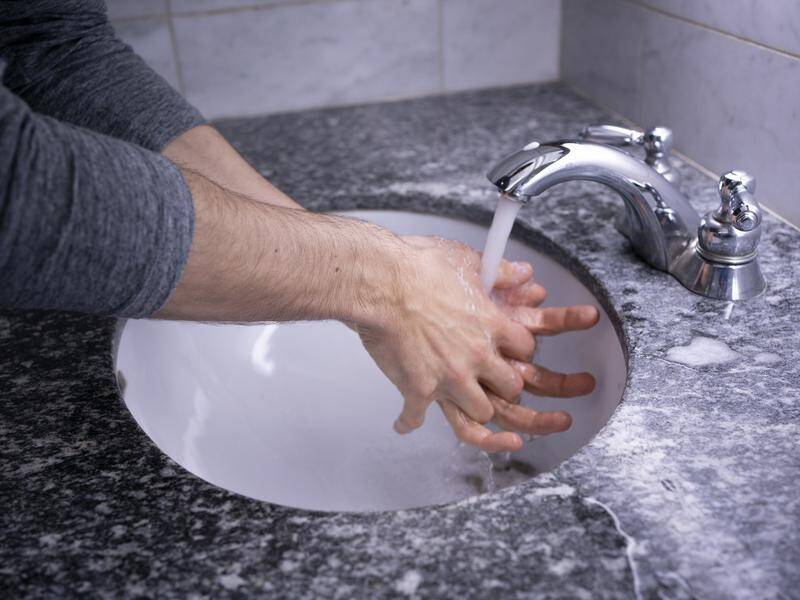 Handwashing at workplace entries and exits are said to be among the UK government's recommendations.