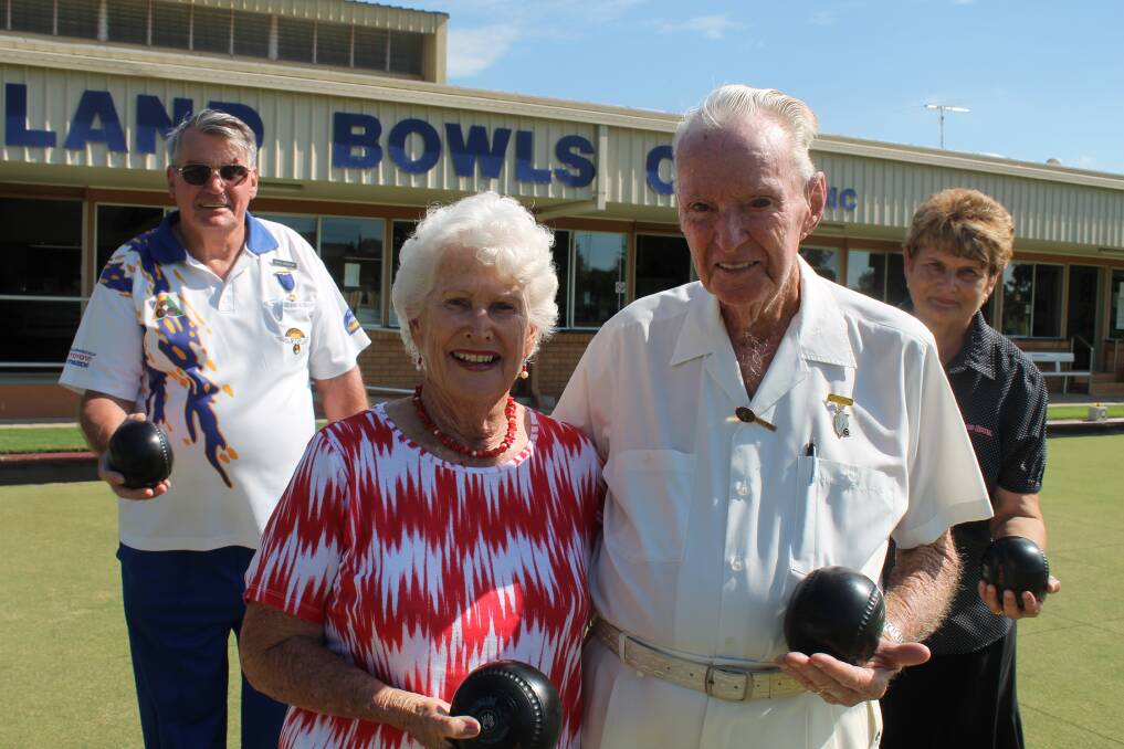 Bowling ... that s how Cleveland Bowls Club member Wally Ross rolls, even at 90. In honour of his commitment to the club and the sport, the new nonagenarian, second from right, was awarded with a Patriarch Medallion by bowls club president Paul Boevionk, left. Wally is also pictured with his wife Mary, second from left, and club board chairwoman Kay Pearson. Photo by Lyn Uhlmann