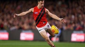 Zach Merrett has led Essendon to a three-point win over Adelaide, with a team-high 28 disposals. (Matt Turner/AAP PHOTOS)