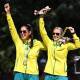 Australians lawn bowlers Kristina Kristc (L) and Ellen Ryan won gold on Sunday in the women's pairs. (Dave Hunt/AAP PHOTOS)