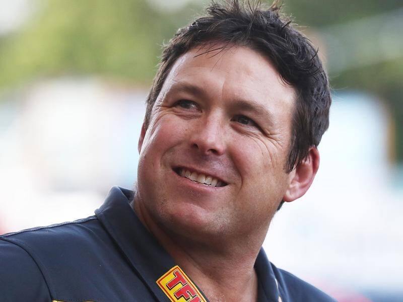 Stuart Dew has signed a contract extension to remain as Gold Coast coach until the end of 2024.