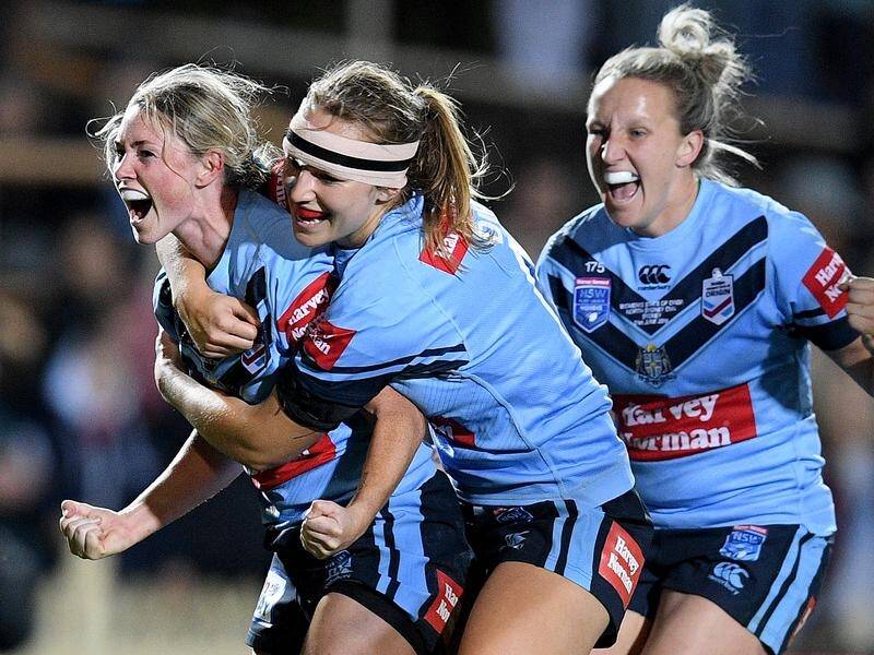 A Maddie Studdon (L) try has sealed NSW's 14-4 Women's State of Origin win over Queensland.