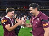 Queensland No.1 Reece Walsh (L) and coach Billy Slater (R) after 2023 State of Origin series win. (Jono Searle/AAP PHOTOS)