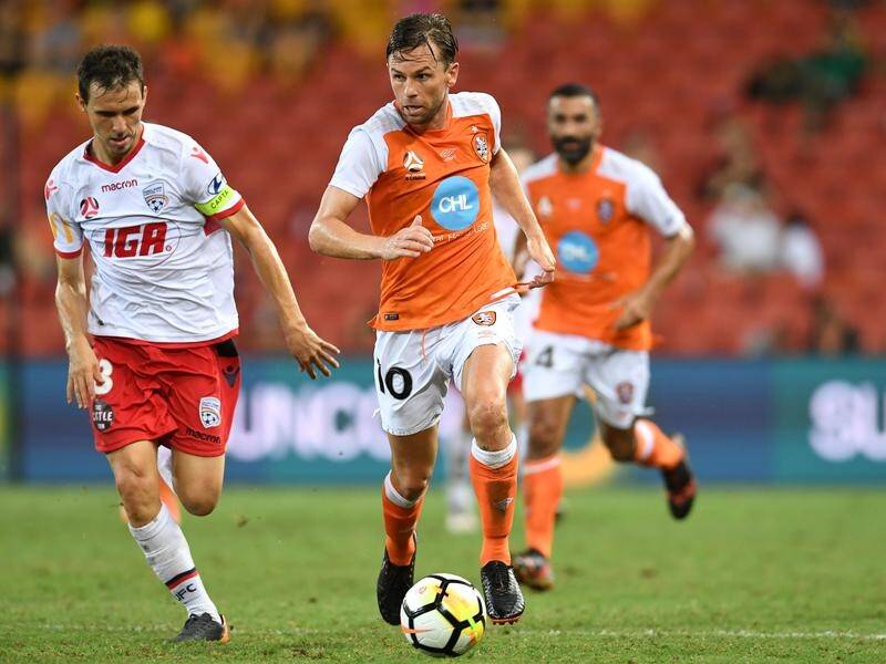 Former Socceroo Brett Holman (C) has re-signed with Brisbane for another A-League season.
