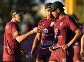 Queensland coach Billy Slater (L) insists Selwyn Cobbo (R) can become an elite centre. (Darren England/AAP PHOTOS)