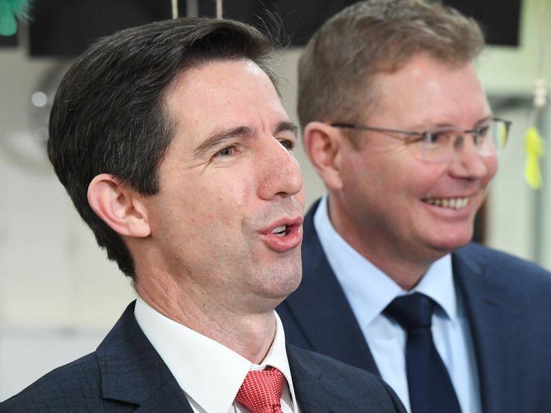 Education Simon Birmingham (L) says new childcare subsidies will benefit low income families.