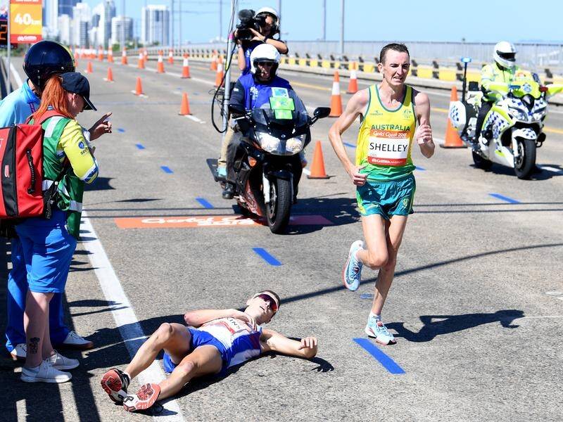 Michael Shelley has won marathon gold for Australia after race leader Callum Hawkins collapsed.