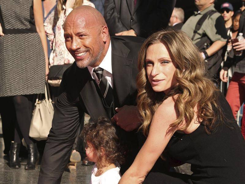 Dwayne Johnson says he and his family are healthy again.