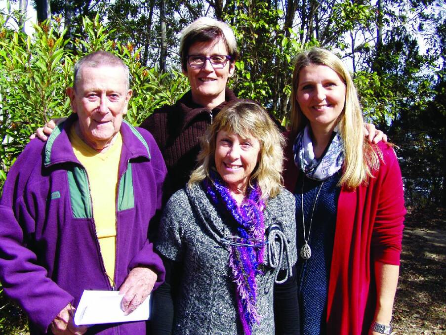 Writers group members (front from left) Desmond Kelly, Robbie Kirk and Irene Sturk, are pictured with Redland author Marianne de Pierres.