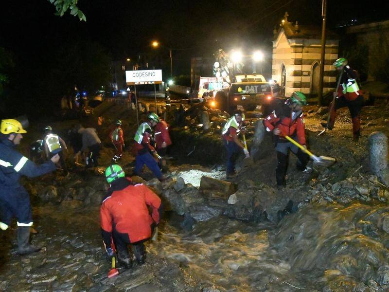 Rescuers are working to clear debris after a landslide in the northern Lombardy region of Italy.