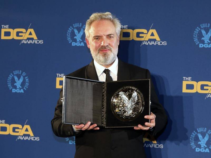 Director Sam Mendes with his award for 1917 at the 72nd Annual Directors Guild of America Awards.