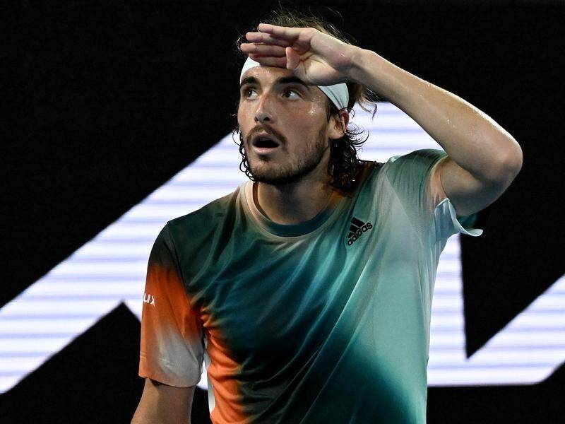 Stefanos Tsitsipas looks up at the crowd after his coaching warning in his Australian Open semi.