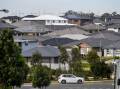 Mortgage holders are hoping for an early Christmas present when the RBA meets on Tuesday over rates. (Brendan Esposito/AAP PHOTOS)