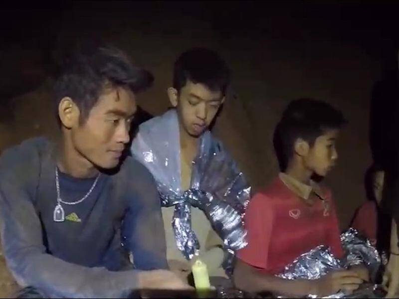 A dozen Australians are helping in the recovery of a young soccer team trapped in a Thai cave.