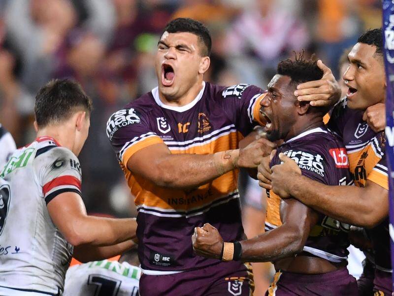 BIG BOY: Teenager David Fifita (c) will become one of three Queensland State of Origin debutants in game one.