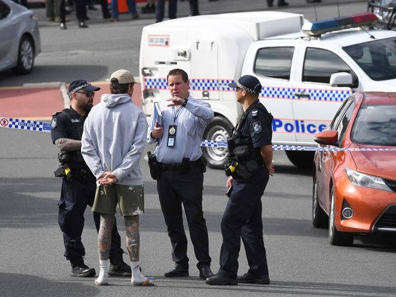 Four people are in custody after a stabbing murder in a Brisbane car park. (Jono Searle/AAP PHOTOS)